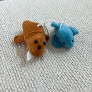 Stuffed animal ornament bundle of 2 walrus and dolphin